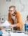 group-of-upset-students-sitting-at-the-table-with-E5YW9L4-1-min